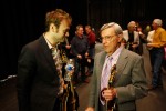 Chris Thile and Herschel Sizemore meet backstage at the Sizemore Benefit concert - photo © Dean Hoffmeyer