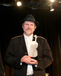 Mark O'Connor accepts Benny Thomasson's induction into the National Fiddler Hall of Fame (2/6/13) - photo by Ken Ames