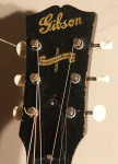 1943 Gibson LG-2 headstock with banner decal