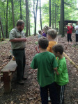 Jayd Raines conducts a demonstration for a group of young visitors at Breaks Interstate Park in Breaks, VA