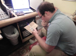 Andy Rigney checking out packaging samples at Dark Shadow Recording