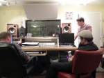 Grant and Andy Rigney listening to playbacks with Stephen Mougin at Dark Shadow Recording