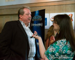 Russell Moore being interviewed by Shannon Turner for Bluegrass Today (8/14/13) - photo by Alane Anno