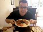 Ned Luberecki with his English Breakfast at the Blue Shutters
