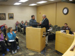 Junior Sisk accepts the Key to the Town of Rocky Mount from Mayor Steven Angle