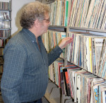 Lee Michael Demsey pulls a gem from WAMU's extensive vinyl collection (2/1/14) - photo by David Morris