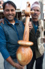 Ram Krisna proudly displays the arboj he made from teak wood - photo by Tara Lindhart 