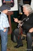 Ricky Skaggs teaching a young banjo player at Red White and Bluegrass 2014 - photo by Jordan Laney