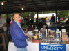 Judy McCulloh staffing the U of I Press booth at a bluegrass festival - photo by Tom Adler