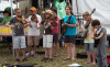Kids busking at the 2015 Grey Fox Bluegrass Festival to raise money for the Grey Fox Kids Academy- photo by Tara Linhardt