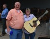 Terri Hudson, winner of the Nichols Road guitar donated by Bruce Clark (Photo courtesy of Tom Feller)