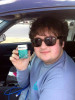 Harry Clark with the pack of cigarettes left behind by the their who stole his car