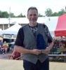 Danny Roberts with his Blue Blazes award at the 2016 Smithville Fiddlers Convention - photo by Bill Conger