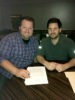 Brad Hudson signs a contract with Pinecastle Records, represented by Ethan Burkhardt
