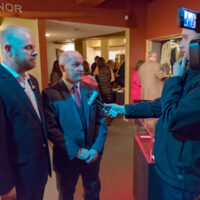Jamie and Darrin shoot a TV interview at the Dailey & Vincent exhibit at the International Bluegrass Music Museum in Owensboro, KY - photo by Ryan Hobson