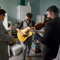 Jesse Baker, Shaun Richardson, and Patrick McAvinue warm up backstage before the concert at the grand opening of the Dailey & Vincent exhibit at the International Bluegrass Music Museum in Owensboro, KY - photo by Ryan Hobson