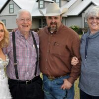 Rhonda Vincent with promoters Norman and Judy Adams with Daryle Singletary at the February Palatka Bluegrass Festival (2/11/17) - photo © Bill Warren