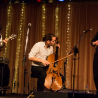 Jeremy Kittel Band (Joshua Pinkham (mandolin), Nathaniel (cello), Jeremy Kittel (fiddle) at Wintergrass 2017 - photo © Tara Linhardt
