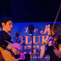 Korey and Sofia of the Korey Brodsky Band at Joe Val Bluegrass Festival (2/18/17) - photo © Tara Linhardt