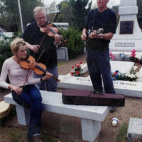 Danny Jones plays a tune at Bill Monroe's grave