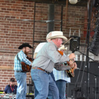 Barry Patton with the Byron Berline Band at G Fest in Muskogee, OK - photo by Budd Hoass