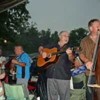 Harbourtown plays without amplification after a thunderstorm sht down the sound system at the 2017 Charlotte Bluegrass Festival - photo © Bill Warren