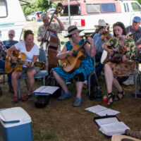 Campers held a memorial jam session for a musician who had passed away this year at Weiser 2017 - photo © Tara Linhardt