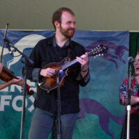 Clare Brown playing fiddle with the Molly Tuttle band at Grey Fox 2017 - photo © Tara Linhardt