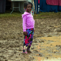 Playing in the mud at Grey Fox 2017 - photo © Tara Linhardt