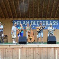 Mark Gaynier hosts an open stage jam session at the 2017 Milan Bluegrass Festival - photo © Bill Warren