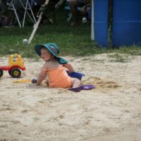 Digging in the sand at the August 2017 Gettysburg Bluegras Festival - photo by Frank Baker