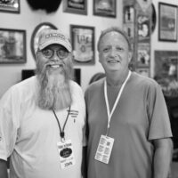 Promoter John Bowers with Barry Crabtree of Dave Adkins Band backstage at Pickin' In Parson 2017 - photo by Jeromie Stephens