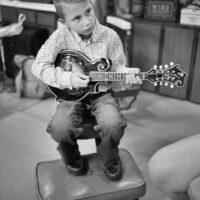 Young mandolinist backstage at Pickin' In Parson 2017 - photo by Jeromie Stephens