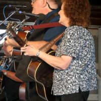 Eddie Gill and Teresa Sells with Big Country Bluegrass at the 2017 Delaware Valley Bluegrass Festival - photo by Frank Baker