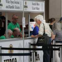 Tom Gray registers at the 2017 IBMA World Of Bluegrass in Raleigh - photo by Frank Baker