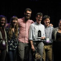 Mile Twelve accepts their Band Momentum award from Molly Tuttle during World of Bluegrass - photo by Frank Baker