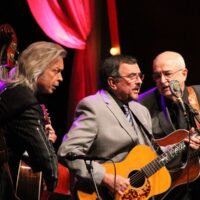 Tim Surrett, Jim Lauderdale, Larry Cordle, and Carl Jackson at the 2017 IBMA Awards - photo by Frank Baker
