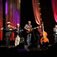 Ricky Skaggs joins Mark Kuykendall and Bobby Hicks at the 2017 IBMA Awards - photo by Frank Baker