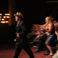 Shawn Camp heads to the stage for his Male Vocaly of the Year award at the 2017 IBMA Awards - photo by Frank Baker