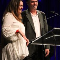 Donna Ulisse and Glenn Duncan accept Song of the Year award at the 2017 IBMA Awards - photo by Frank Baker