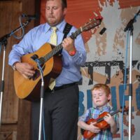 Ryan Frankhouser and his son Bodie with Remington Ryde at the August 2017 Gettysburg Bluegrass Festival - photo by Frank Baker