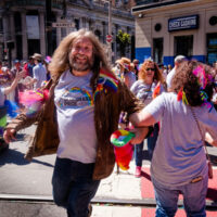 Jeff Scroggins dances with Betty Bugaj in the Bluegrass Pride contingent at the 2017 SF Pride Parade