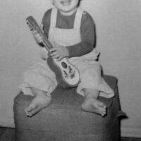 Dudley Connell with his first guitar, er... ukulele - November 1957