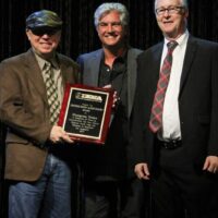 Terry Herd, Jerry Salley, and John Lawless accepting a 2017 Distinguished Achievement Award from the IBMA - photo by Frank Baker