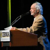 Scott O'Malley accepting Norman Blake's 2017 Distinguished Achievement Award from the IBMA - photo by Frank Baker