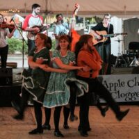 Apple Chill Cloggers in the dance tent at the 2017 Wide Open Bluegrass Streetfest - photo by Frank Baker