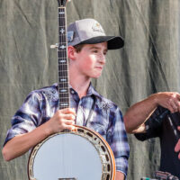 Riley Gilbreath with his new Huber Workhorse banjo - photo by Nathaniel Dalzell