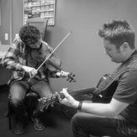 Mike Barnett and Jake Workman warm up backstage at The Birchmere (1/27/18) - photo by Jeromie Stephens
