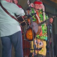 Little Roy crashes Dry Branch Fire Squad's set at the February 2018 Palatka Bluegrass Festival - photo © Bill Warren