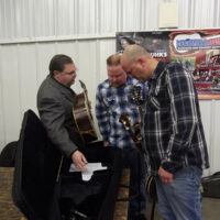 Junior Sisk talks with members of Caney Creek at the Ohio Ernie Thacker benefit (2/10/18)
